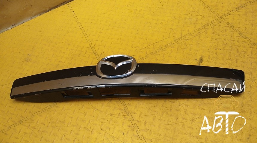 Mazda CX 9 Накладка двери багажника - OEM TD1750810F